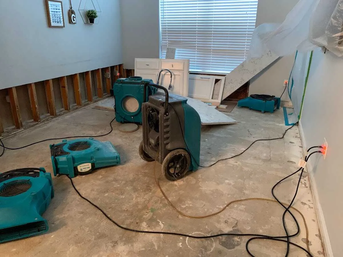 Dehumidifier in flood-cut room for Water Damage Restoration in Winslow